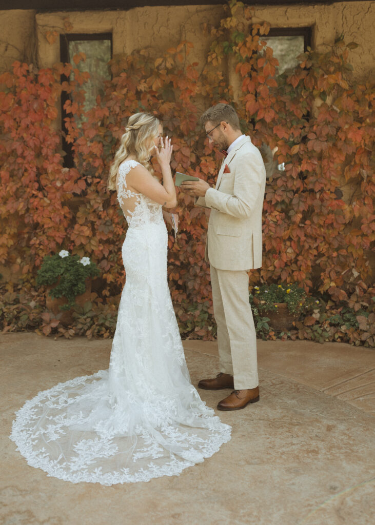 bride and groom reading vows at their Villa Parker Wedding 