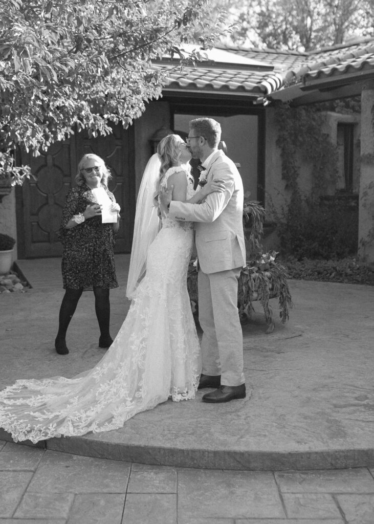 bride and grooms first kiss at the Villa Parker 