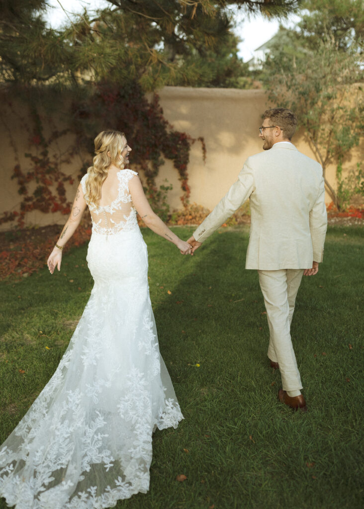 bride and groom taking wedding photos at Villa Parker