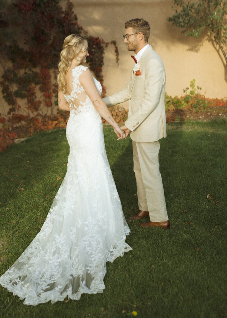 bride and groom taking wedding photos at Villa Parker