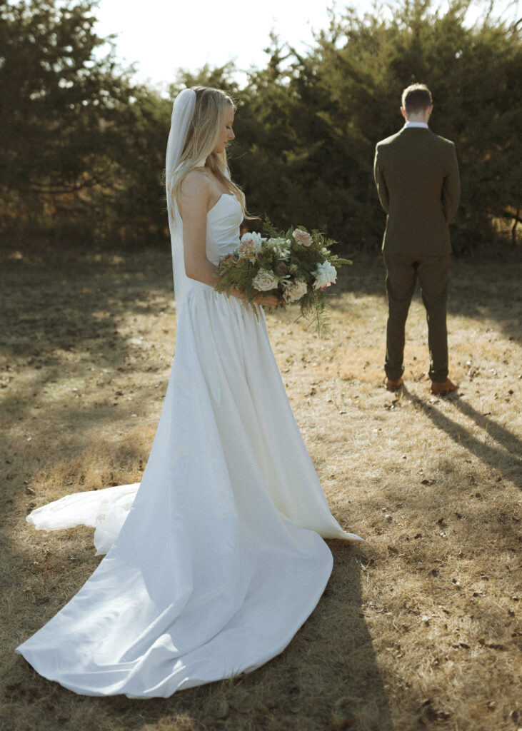 bride walking up to the first look at Roca Ridge Events 