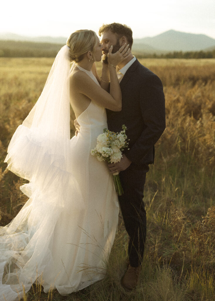 couple taking photos for their colorado elopement 