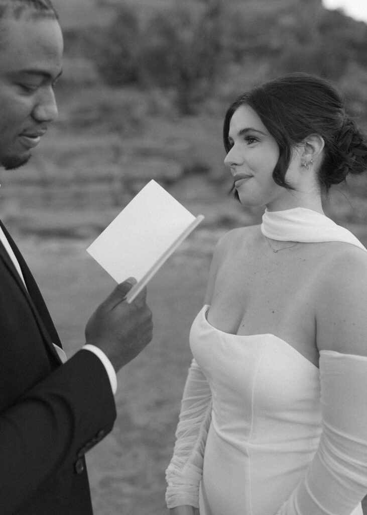 bride and groom reading their vows for their elopement 