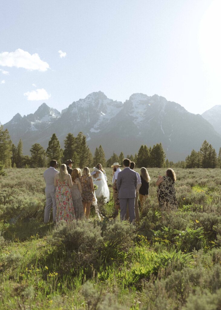 bride and groom with their family for their elopement ceremony