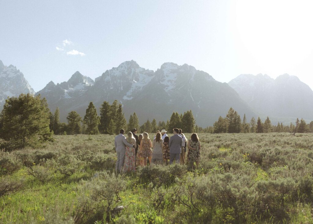 bride and groom eloping with family in the Grand Tetons