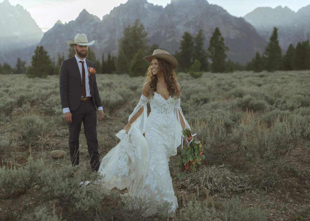 bride and groom taking elopement photos