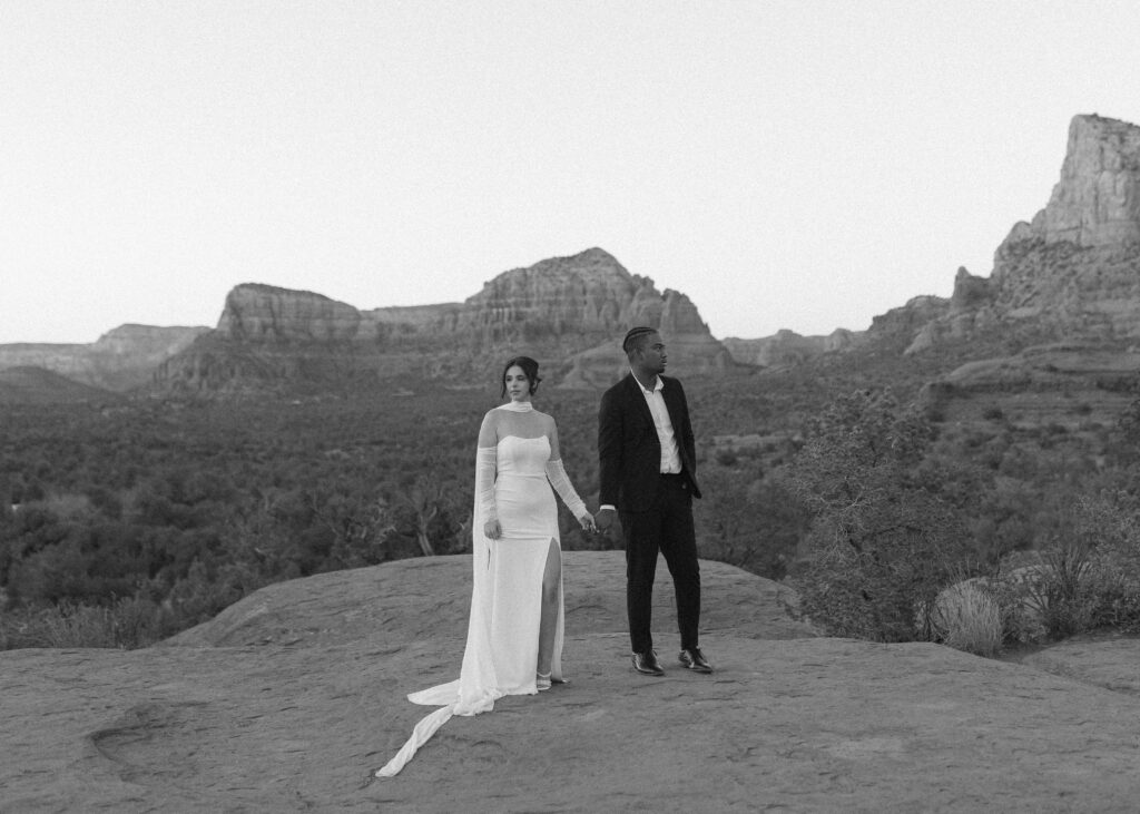 bride and groom taking their elopement wedding photos