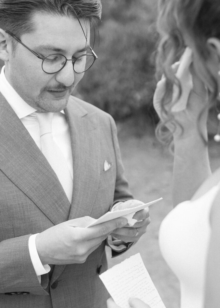 bride and groom reading vows for their elopement