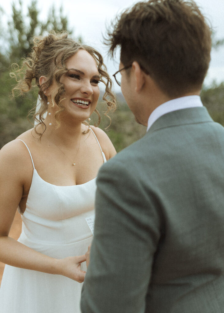 bride and groom first look in sedona