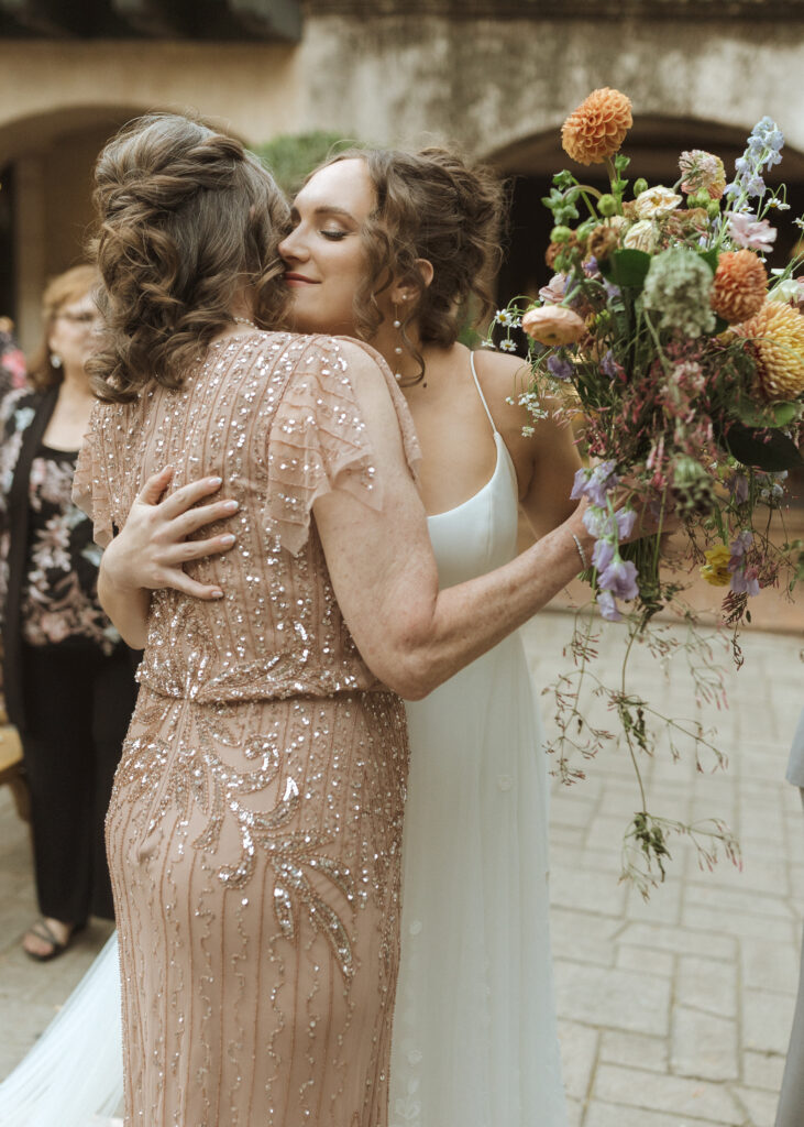 bride hugging her mom at her Tlaquepague wedding