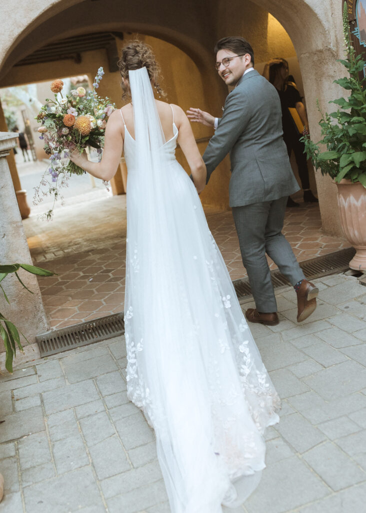 bride and groom walking away from their wedding ceremony at Tlaquepague