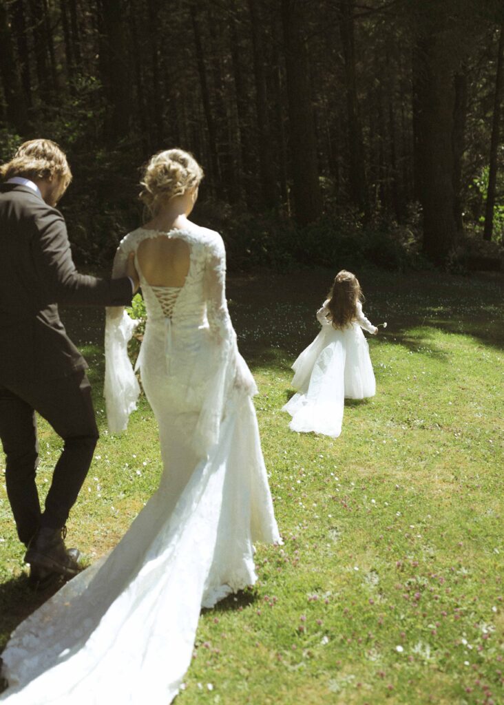 candid photo of bride and groom walking during their elopement day