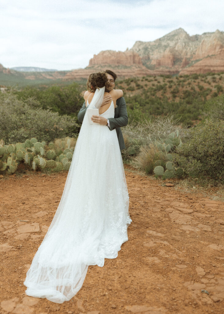 bride and groom hugging during their elopement after their first look