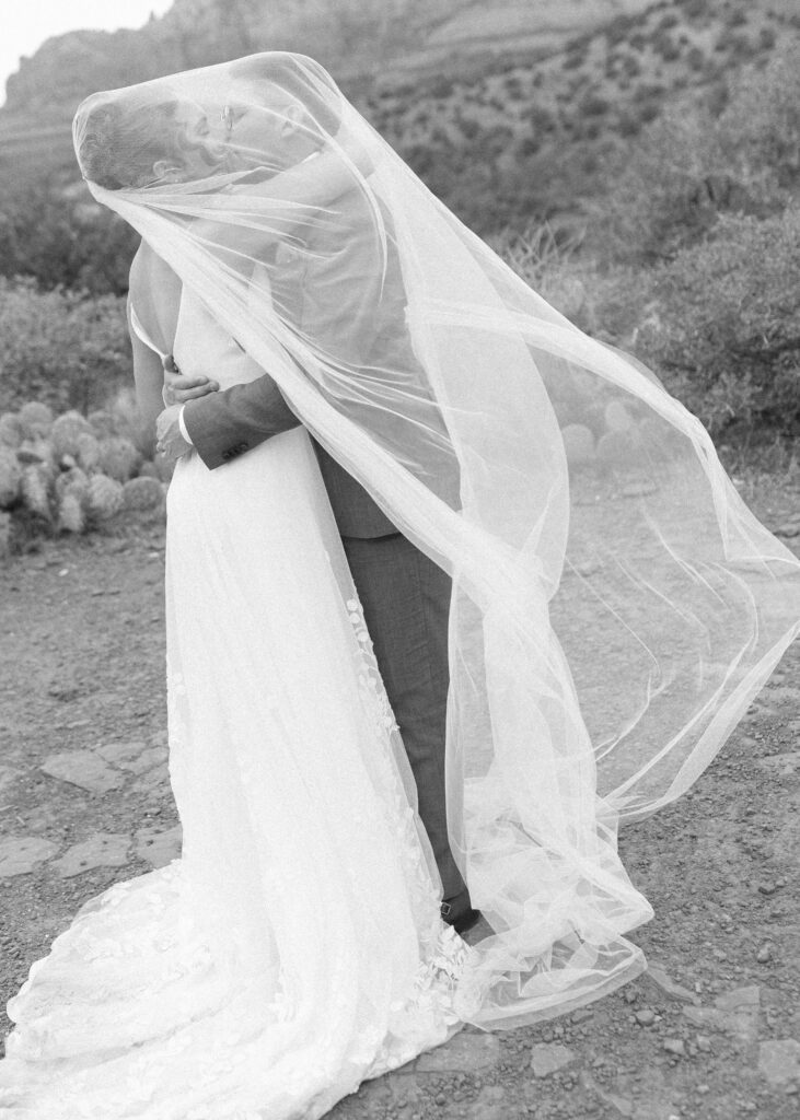 bride and groom taking elopement photos