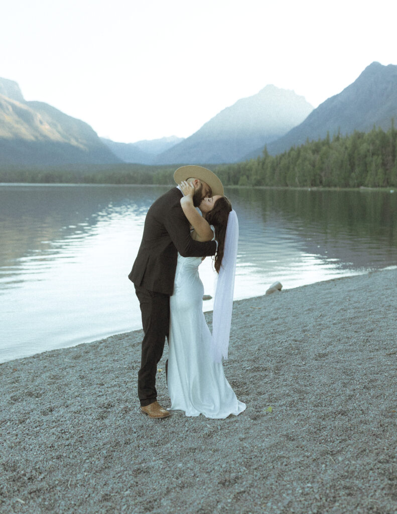 bride and groom reading their vows for their Lake McDonald Elopement