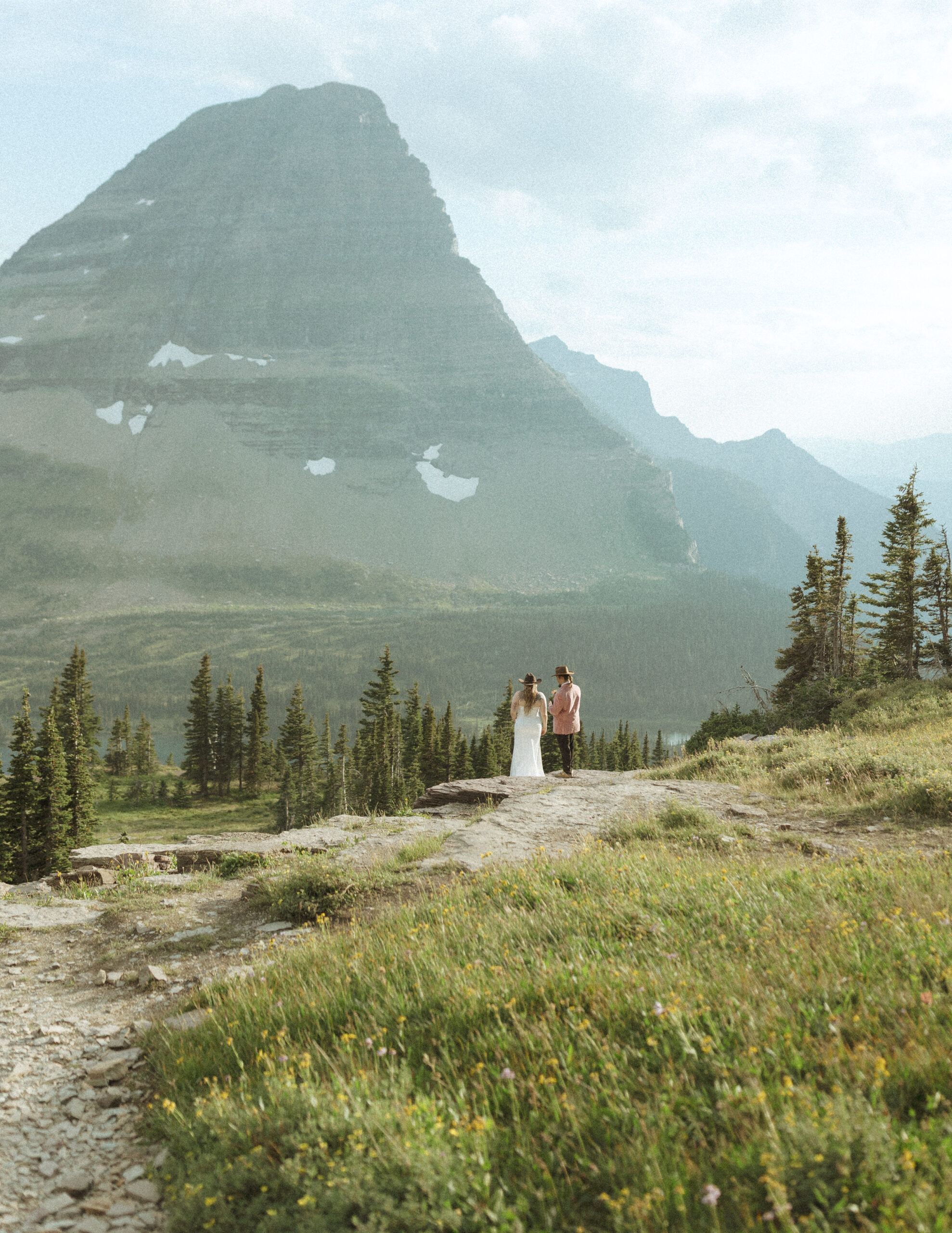 Couple eloping at Logan Pass