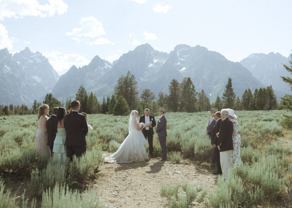 bride and groom reading their vows for their mountain view turnout wedding