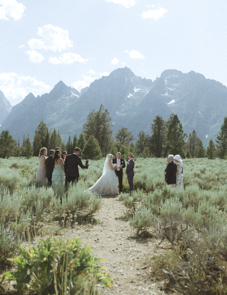 bride and groom reading their vows for their mountain view turnout wedding