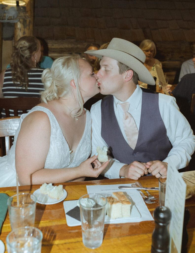 bride and groom at dinner after their wedding at mountain view turnout