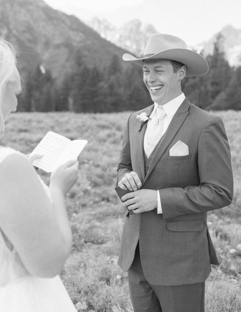 bride and groom reading their vows privately before their mountain view turnout wedding