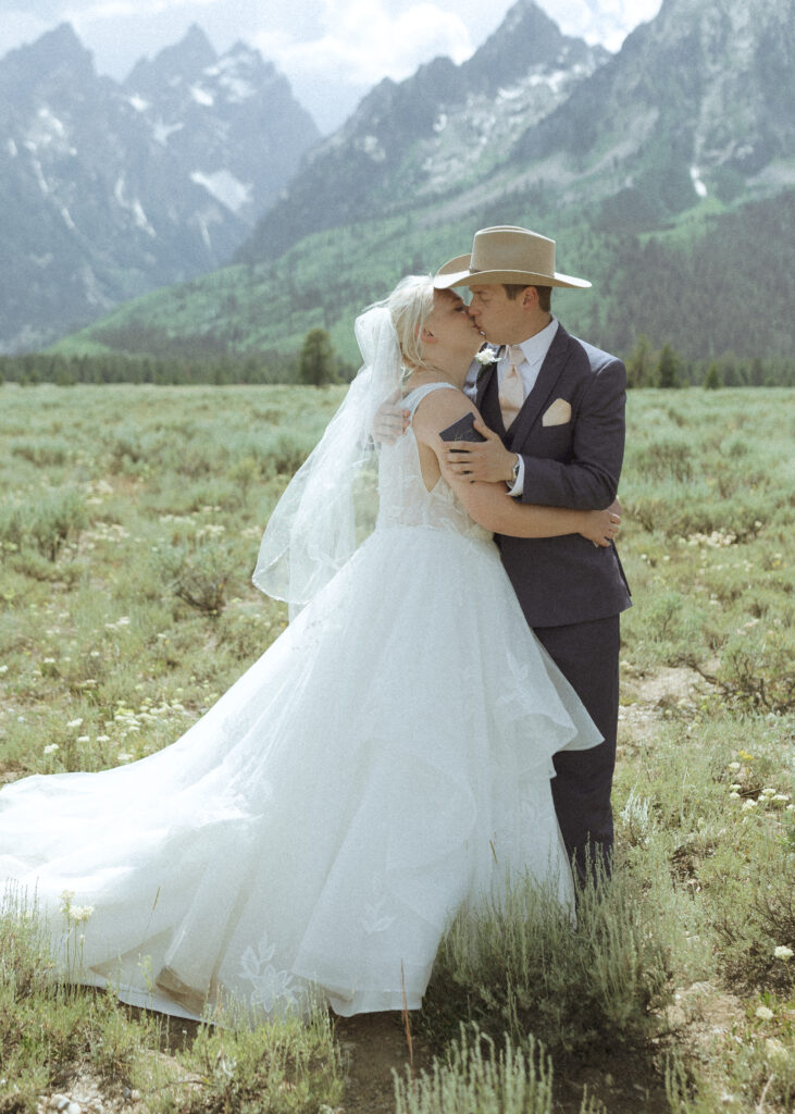 bride and groom reading their vows privately before their mountain view turnout wedding