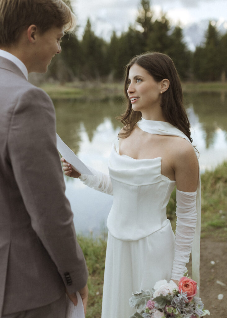 couple reading their vows at their Schwabacher Landing Elopement