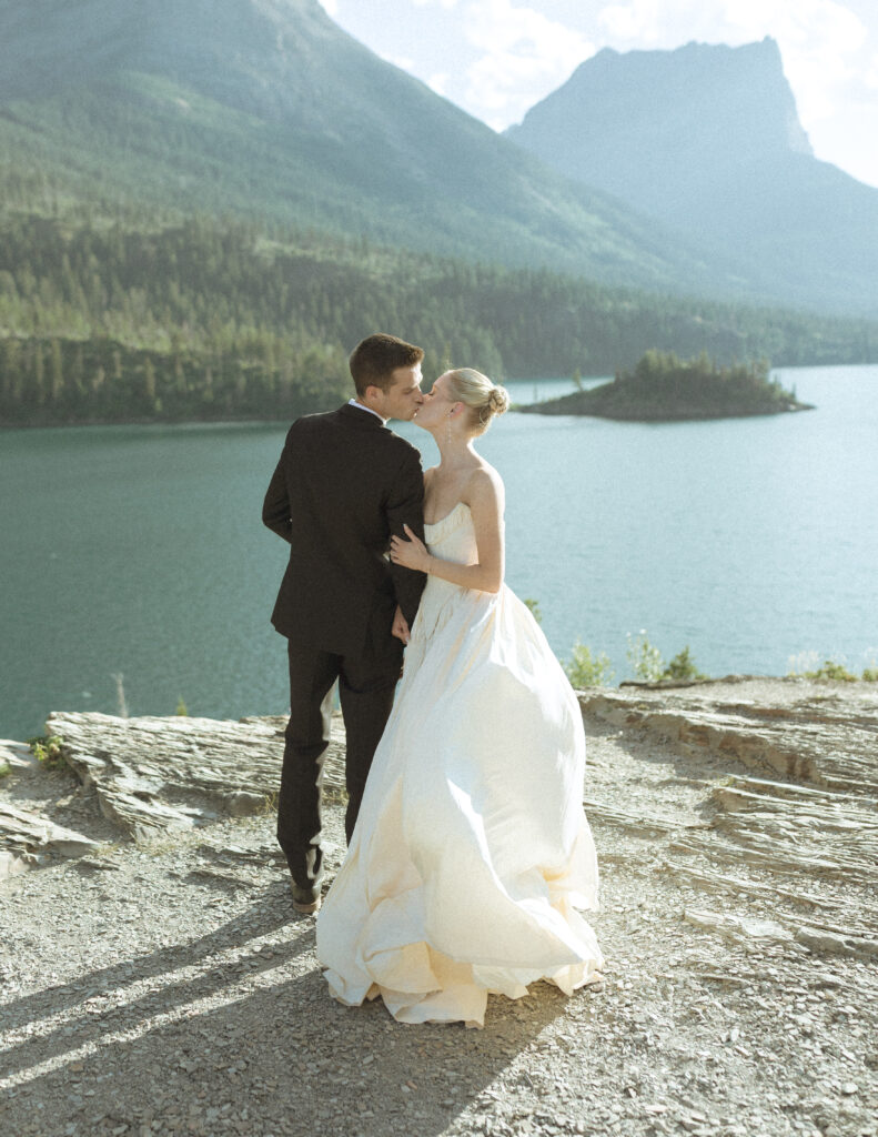 bride and groom taking photos for their sun point elopement