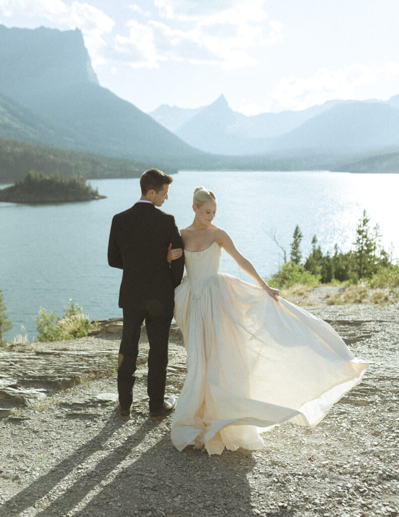 bride and groom taking photos for their sun point elopement