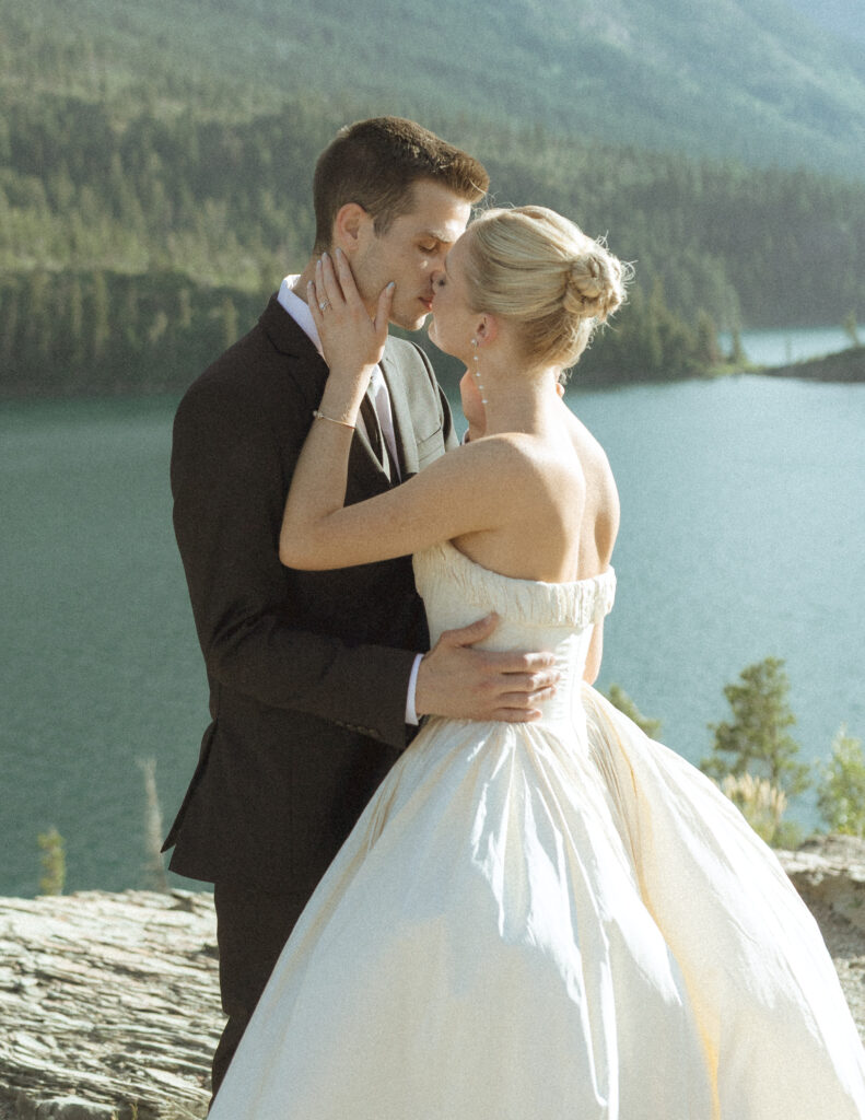 bride and groom taking photos for their sun point elopement
