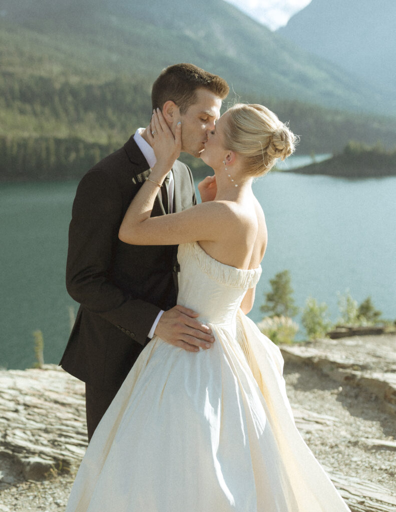 bride and groom taking photos for their sun point elopement