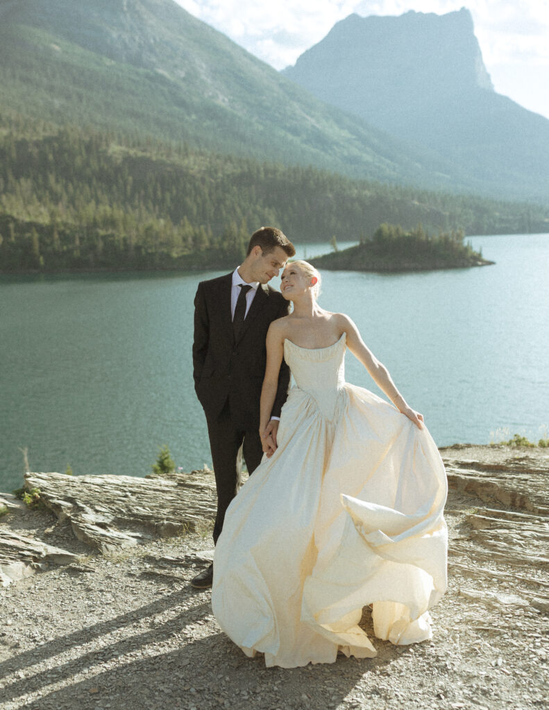 bride and groom taking photos for their sun point elopement