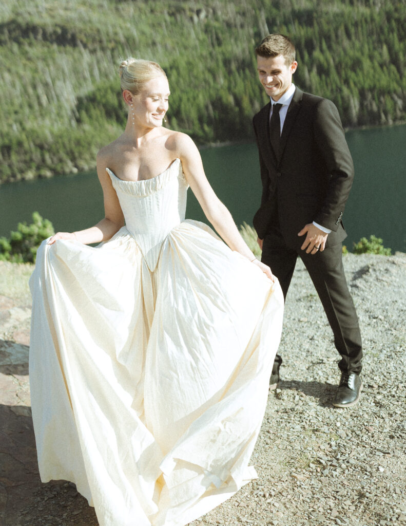 bride and groom taking photos for their sun point elopement