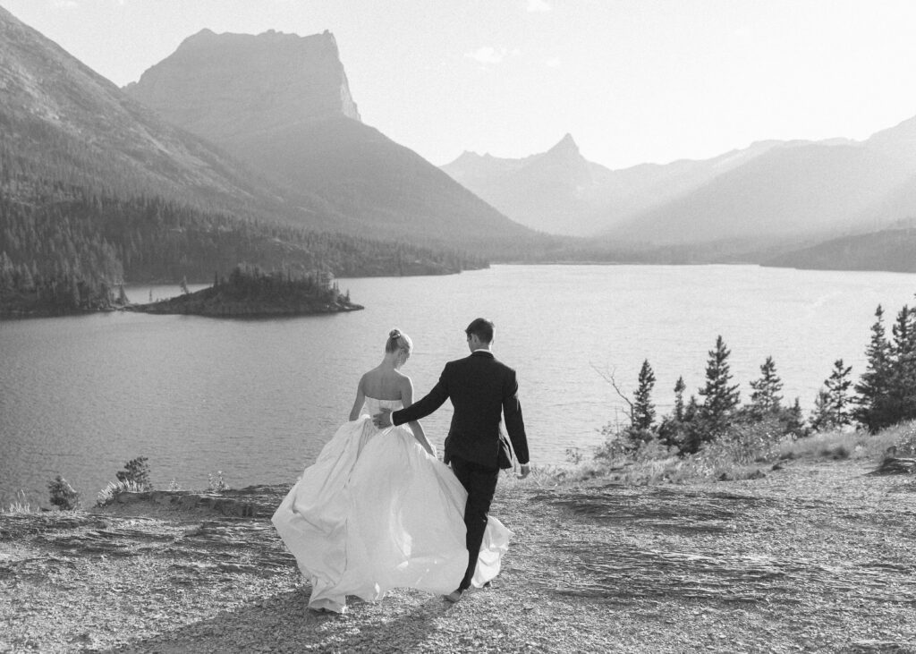 bride and groom taking photos for their sun point elopement