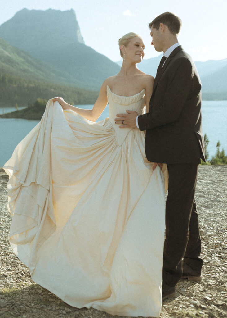 bride and groom taking photos for their sun point elopement