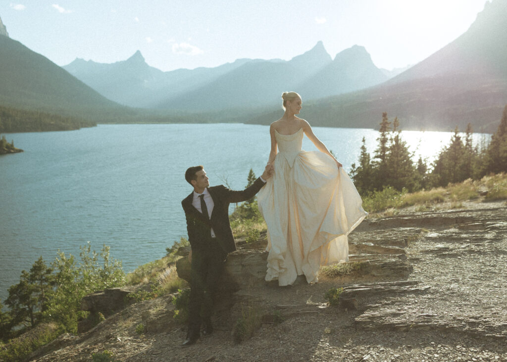 bride and groom taking photos for their sun point elopement