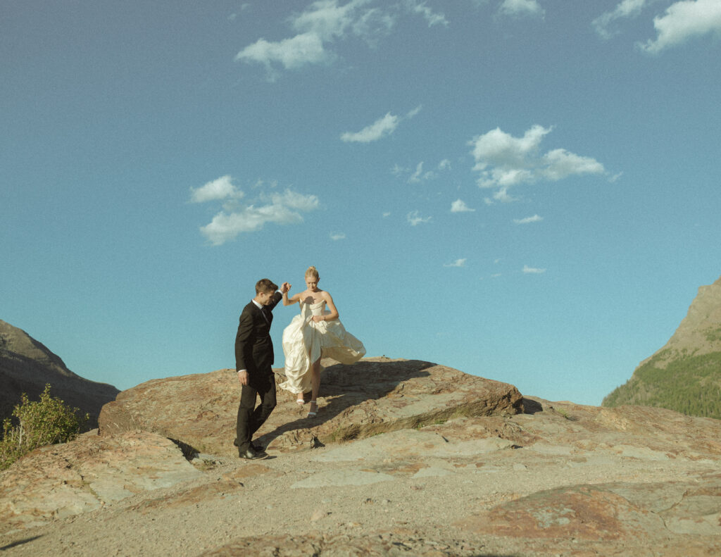 bride and groom taking photos for their sun point elopement