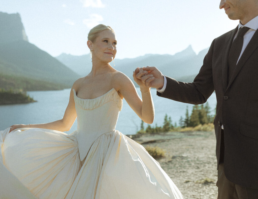 bride and groom taking photos for their sun point elopement
