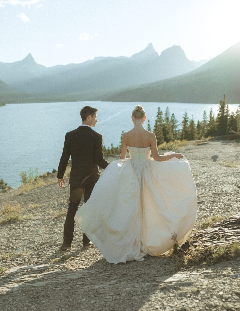 bride and groom taking photos for their sun point elopement