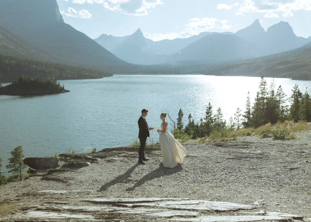 bride and groom reading vows at their sun point elopement