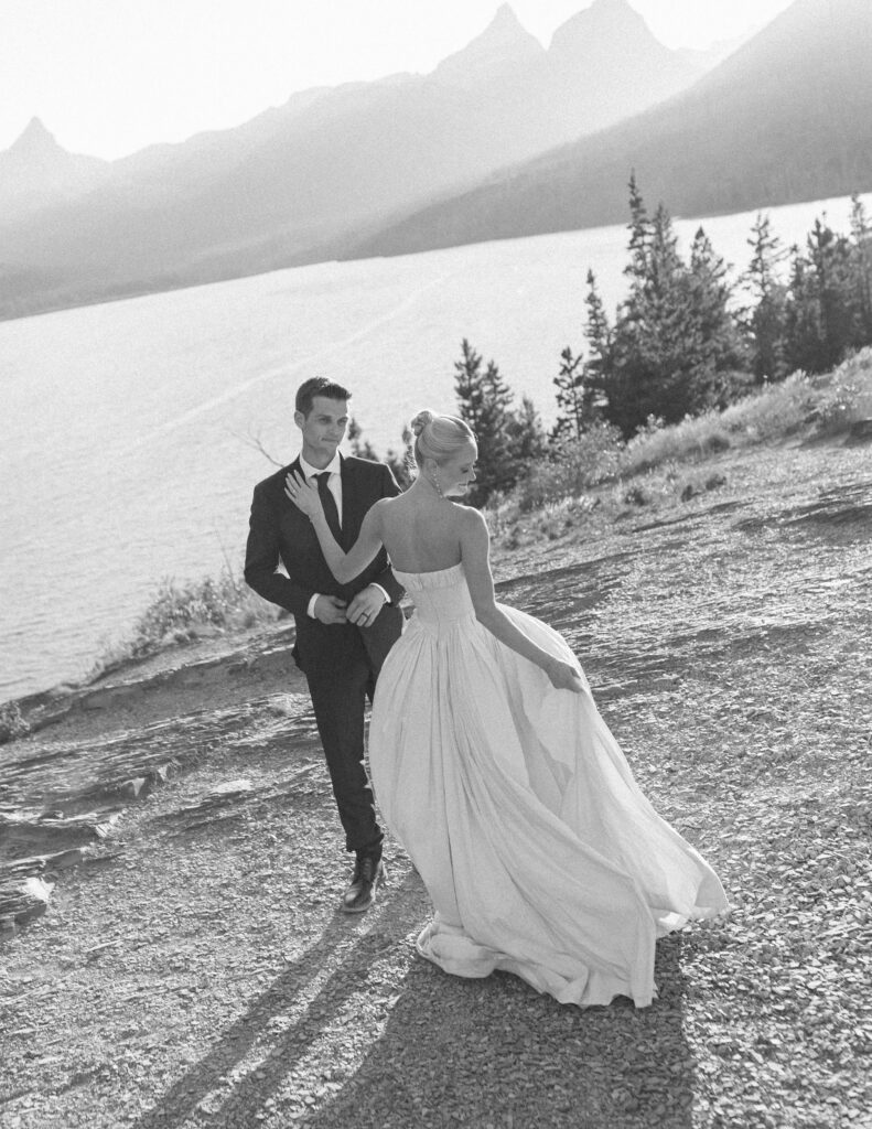 bride and groom taking photos for their sun point elopement