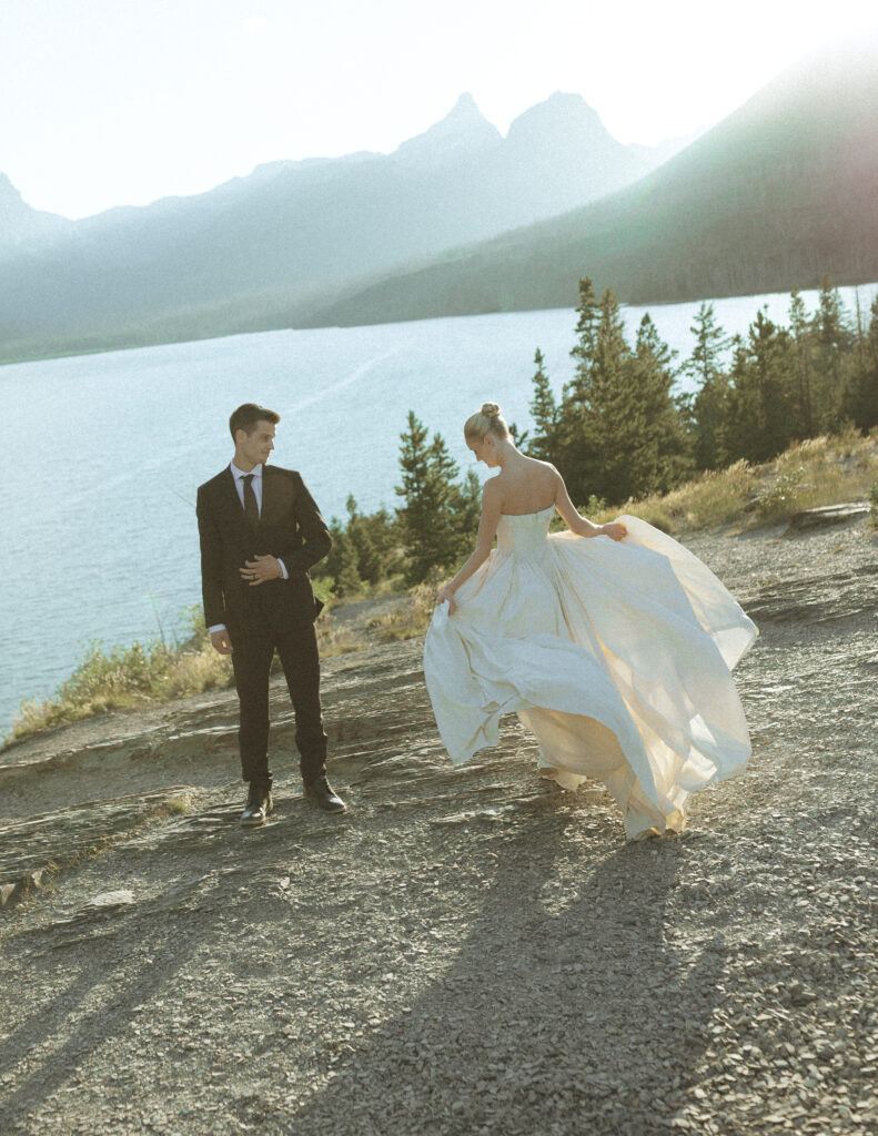 bride and groom taking photos for their sun point elopement