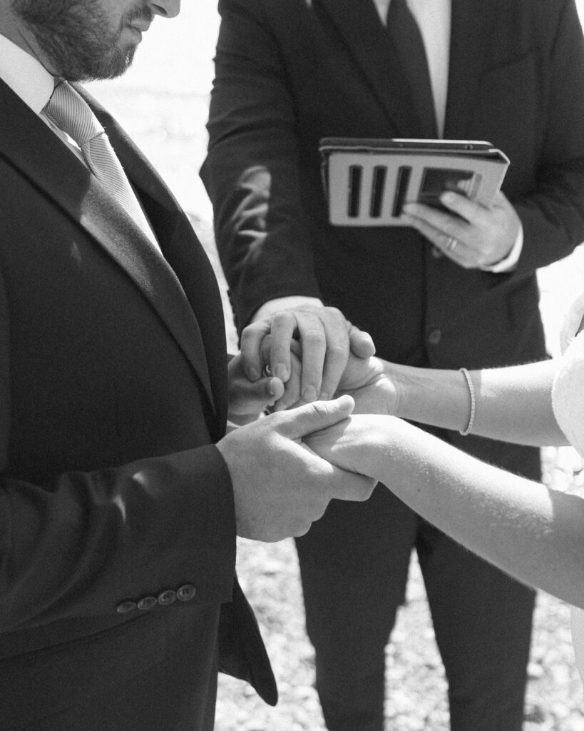 couple reading their vows for their Two Medicine Lake Elopement 