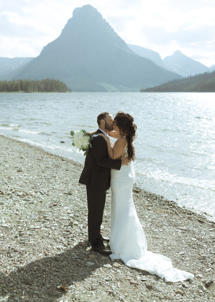couple reading their vows for their Two Medicine Lake Elopement 