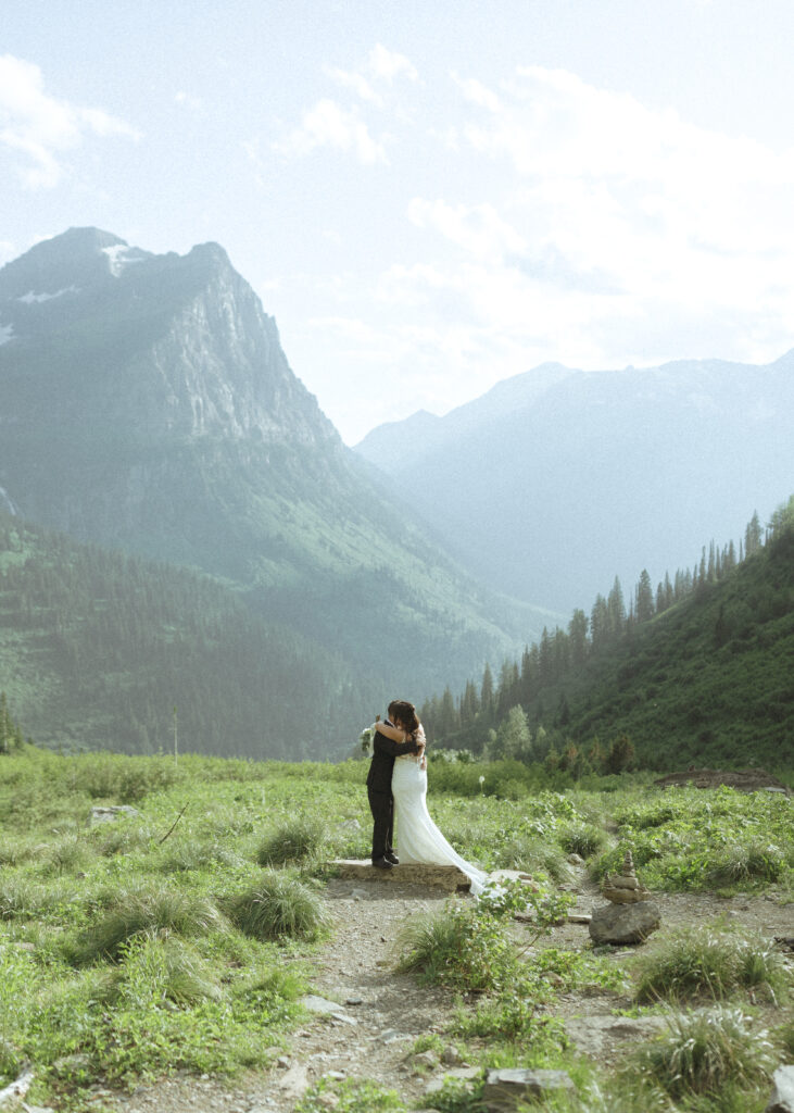 couple exploring Glacier National Park after their Two Medicine Lake Elopement 