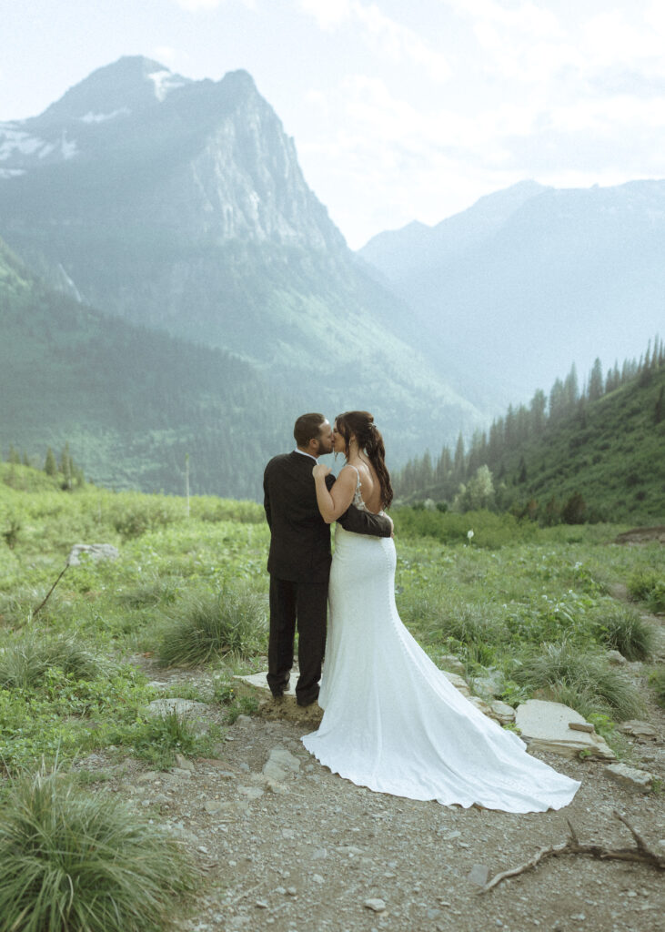couple exploring Glacier National Park after their Two Medicine Lake Elopement 