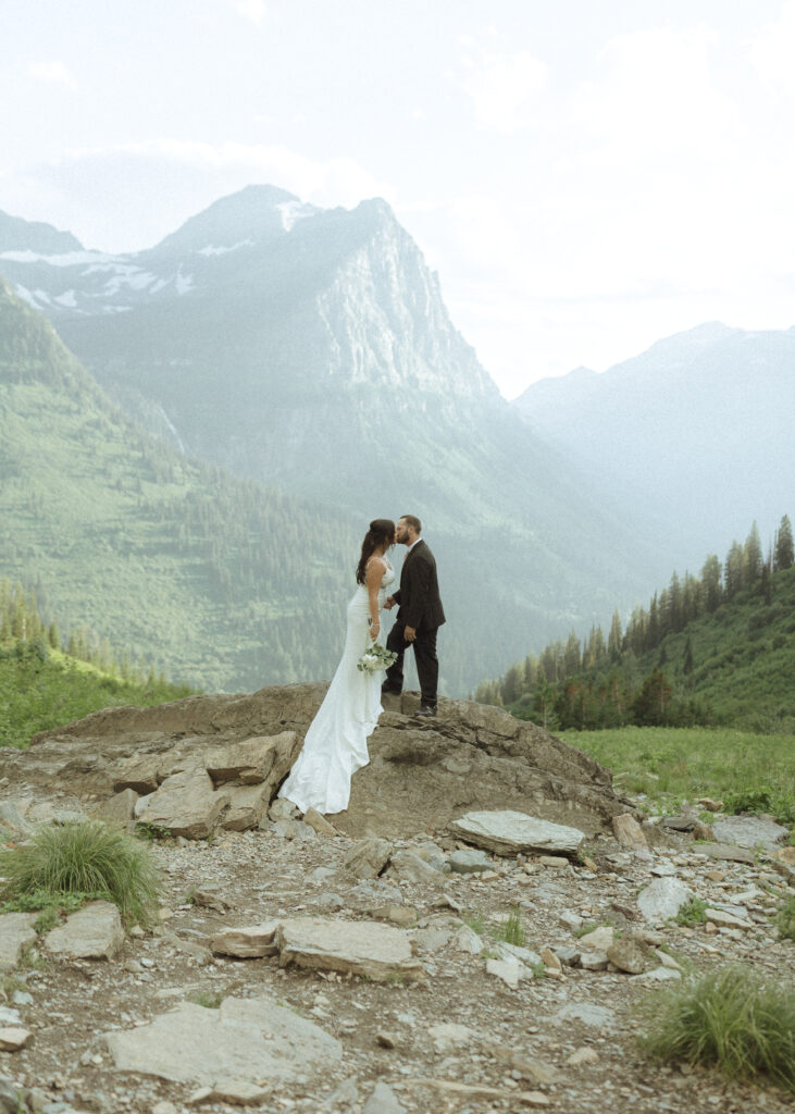 couple exploring Glacier National Park after their Two Medicine Lake Elopement 