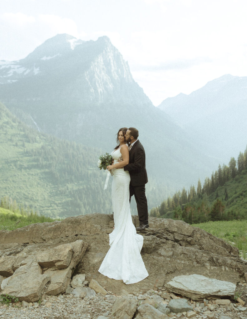 couple exploring Glacier National Park after their Two Medicine Lake Elopement 