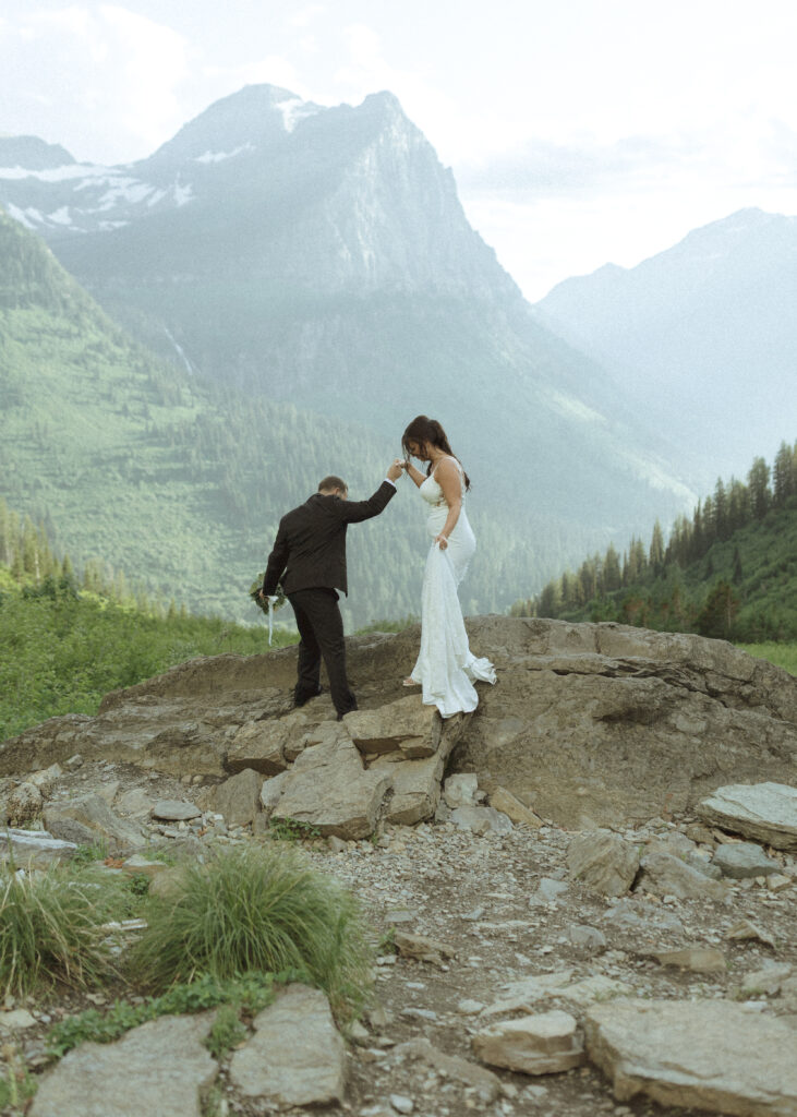 couple exploring Glacier National Park after their Two Medicine Lake Elopement 