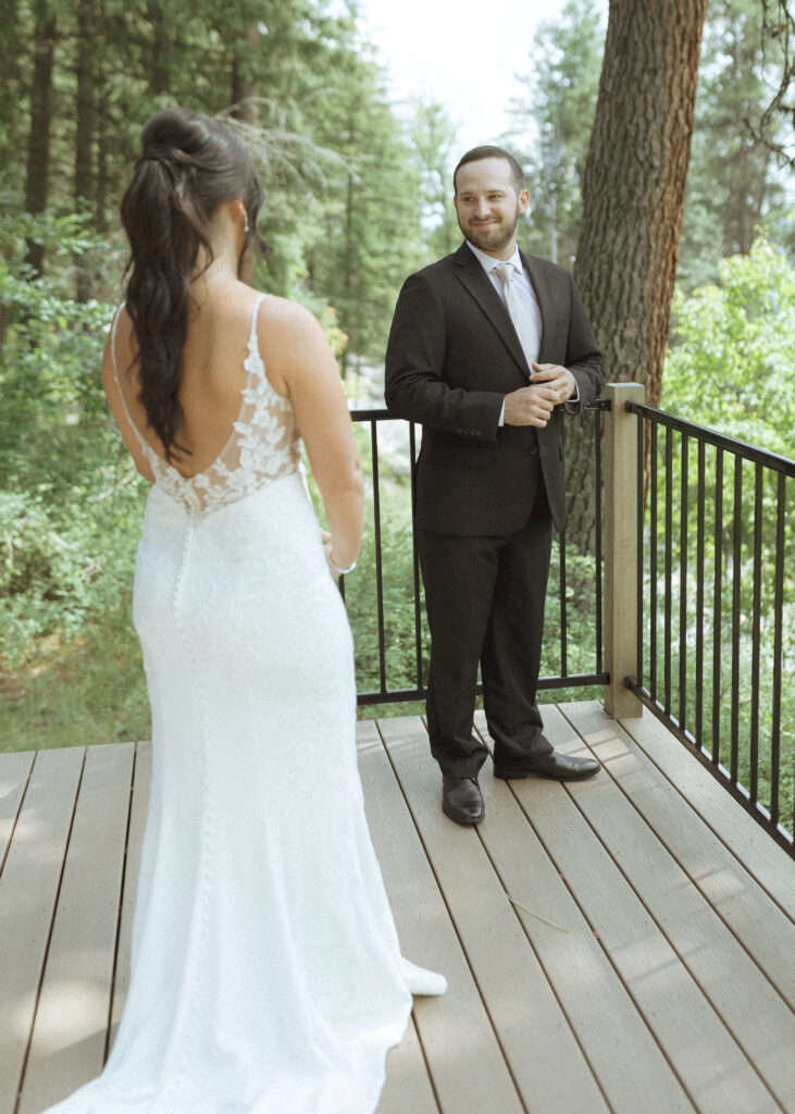 couples first look before their Two Medicine Lake Elopement 
