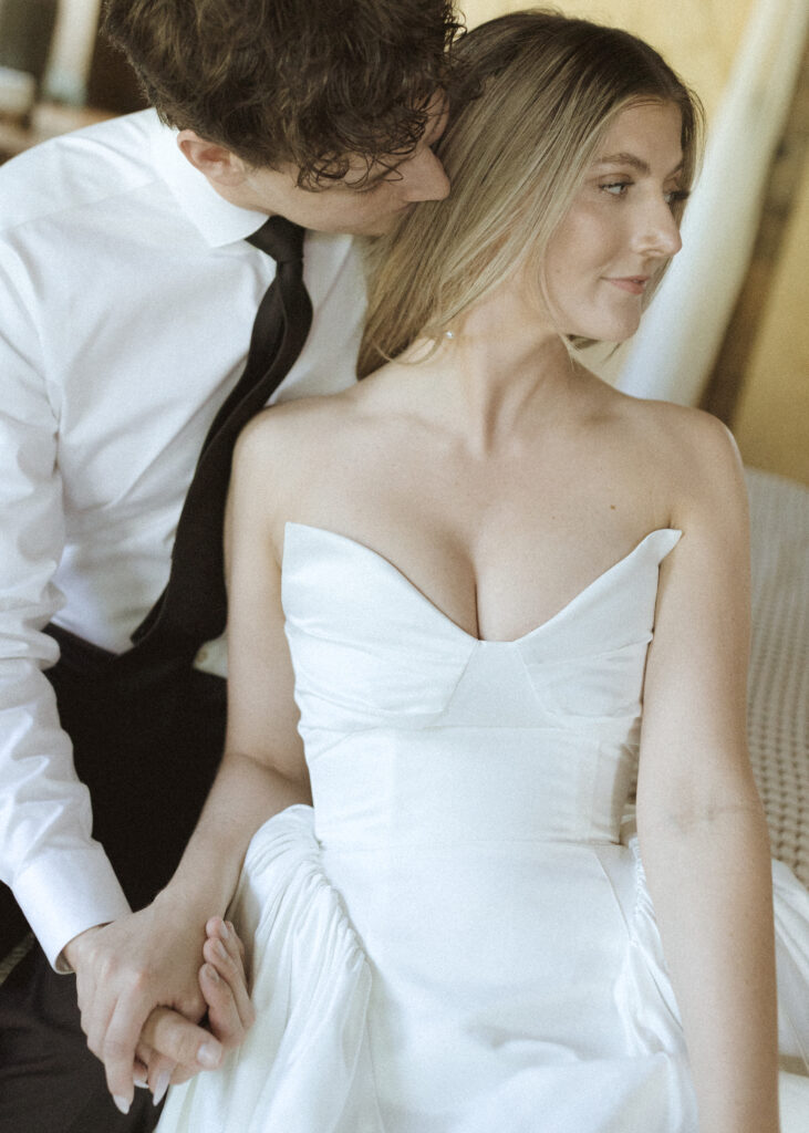 couple getting ready for their Wyoming horse elopement
